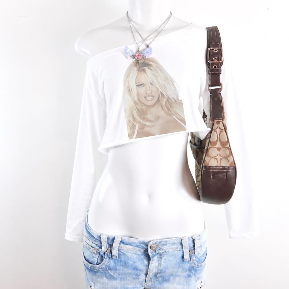 white pamela anderson graphic off shoulder crop top